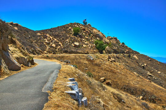 Mt Rubidoux Trail California Pathway Rocky Hillside with American Flag and Cross