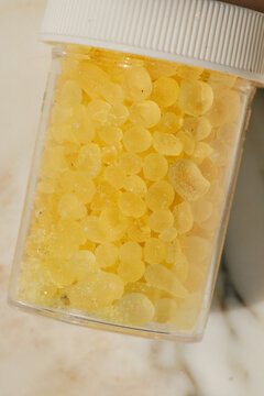 jar of mastic drops, balls