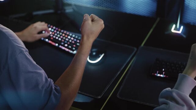 Professional Gamers Celebrating Victory During Competition
