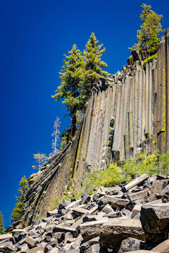Devils Postpile basalt columns rise on sunny day