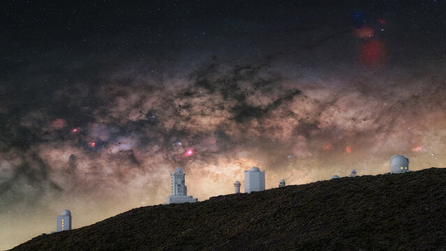 View of Observatorio Astronomico del Teide under the starry Milky Way galaxy at night in Izana, Canarias, Spain.