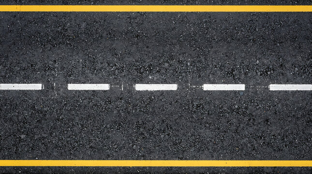 Top down view asphalt road surface featuring solid yellow lines with a broken white center divider with angle overhead perspective perspective dark textured