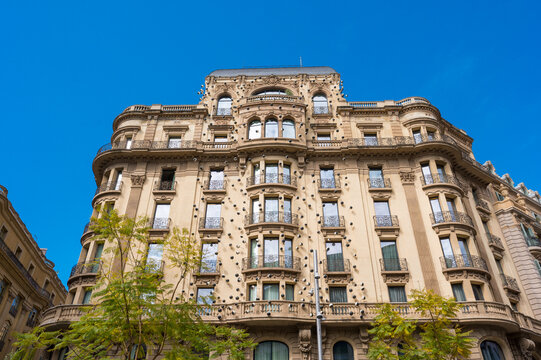 Barcelona, Spain - April 16, 2026: Hotel Ohla facade with ceramic eyes decoration designed by Frederic Amat.