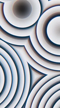 Animated abstract concentric rings with evolving shading and beveled relief across tiled geometric surface