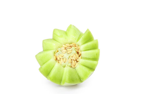 Fresh Honeydew Melon Half with Green Flesh and Seeds on White Background