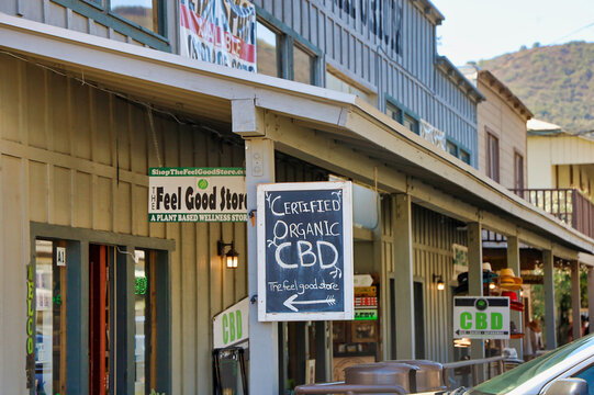 Temecula, CA USA on October 8, 2022. The Certified Organic CBD chalkboard sign at the feel good store at Old Town Temecula, USA. Plant Based Wellness Dispensary Storefront.