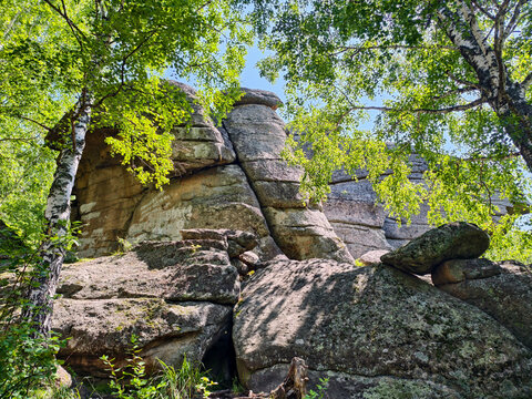 Photo of rocks in the forest on a mount Tserkovka near the Altai resort of Belokurikha.