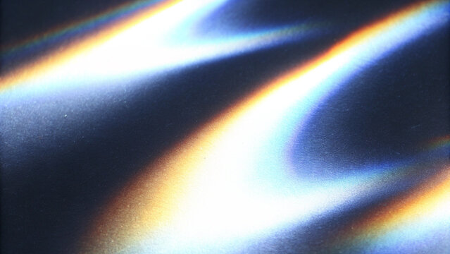 Rainbow iridescent holographic gradient with crystal prism rays, colorful light flare and sparkle, abstract retro film burn overlay for creative designs.