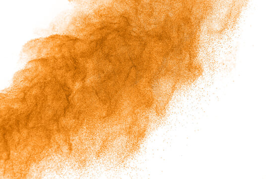 Orange powder cloud exploding on a clean white background, creating a dynamic abstract texture with fine particles, soft edges, and negative space for creative advertising, packaging, posters.