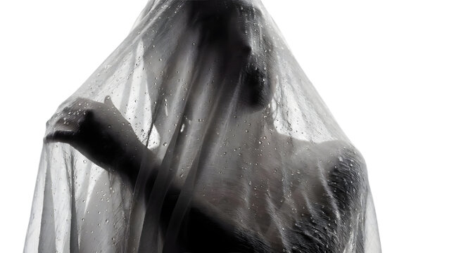 Person trapped behind wet translucent plastic sheet.