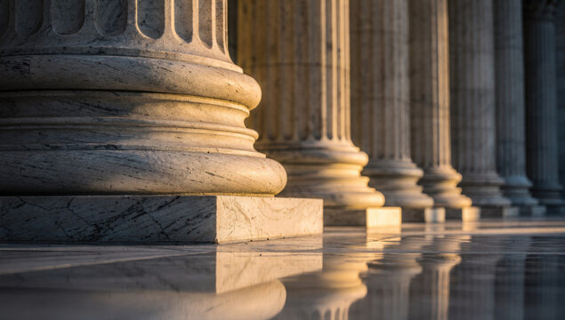 Classical stone pillars representing justice legal system financial stability and strong institutional foundation