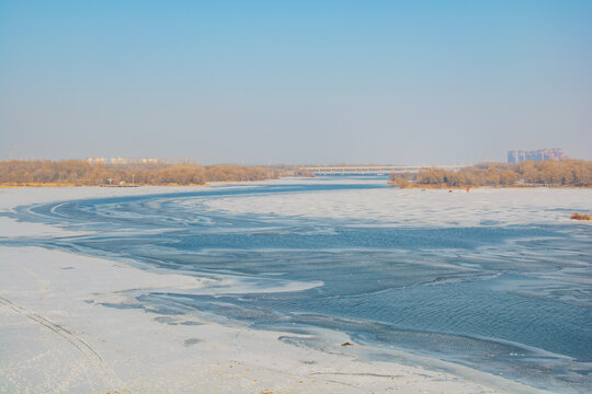 Frozen River and Bridge in Shenyang Winter Landscape