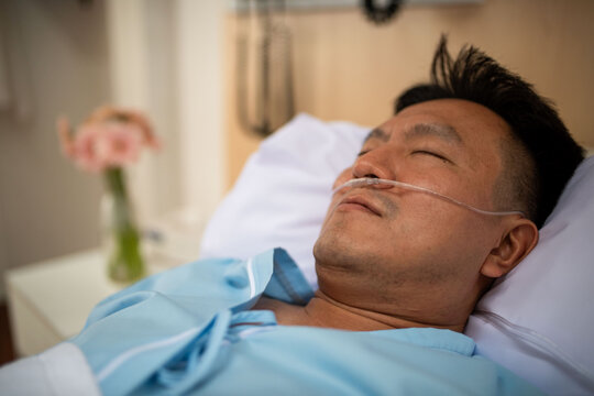 Resting patient in hospital bed
