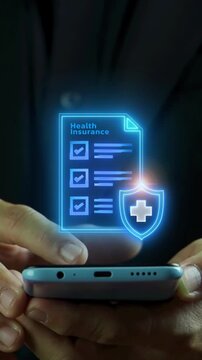 Businessman holding smartphone vertical shot displaying glowing medical claim document list protected by cross shield badge. Mobile health insurance policy and electronic claim process concept.