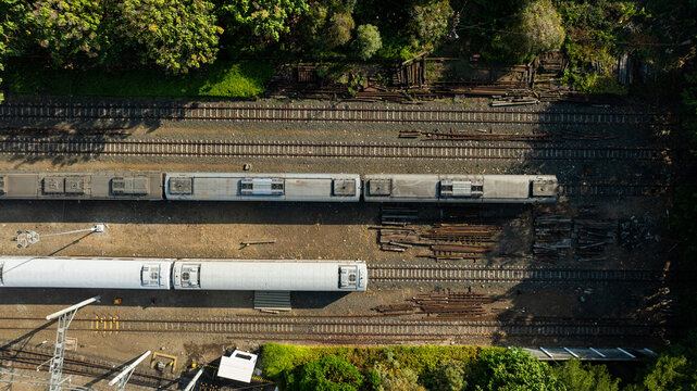 Top down aerial view of trains on Yogyakarta railway tracks