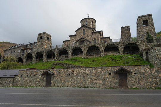 Alania Assumption Monastery on a cloudy October evening. Hidikus. North Ossetia-Alania, Russian Federation