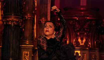 A dancer dances flamenco with passion and gives emotions to her dear friends © corradobarattaphotos