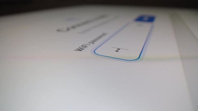 Motorized moving shot of entering WiFi password on tablet, shot with macro probe lens