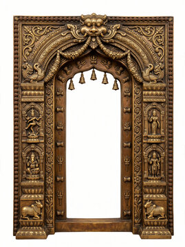 South Indian temple doorway with hanging bells, sacred figures, carved floral arch and antique bronze ornamentation