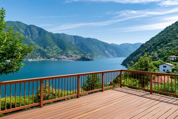 Fototapeta premium Wood deck overlooking a beautiful lake and mountains