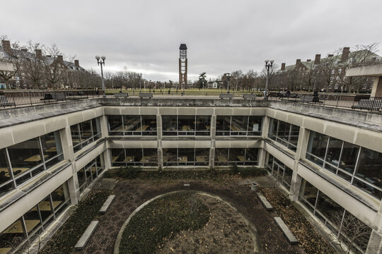 Champaign, Illinois, United States - 18 January 2017: View of the Undergraduate Library courtyard at the University of Illinois Urbana-Champaign, with its sunken garden and bell tower.