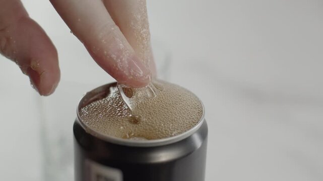 Opening can of soda. 24fps. Tripod shot. Original sound