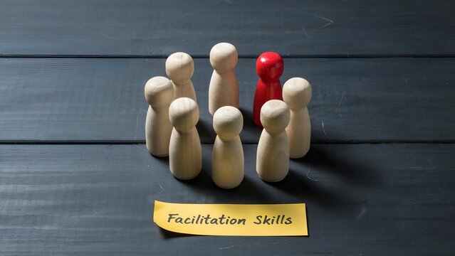 Facilitation skills concept with wooden figures