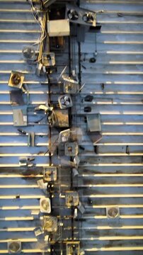 Panning along a rooftop fan arrangement