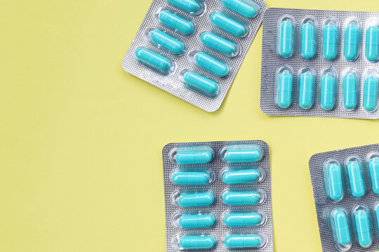 Blue capsules of Doxycycline in blister packs.