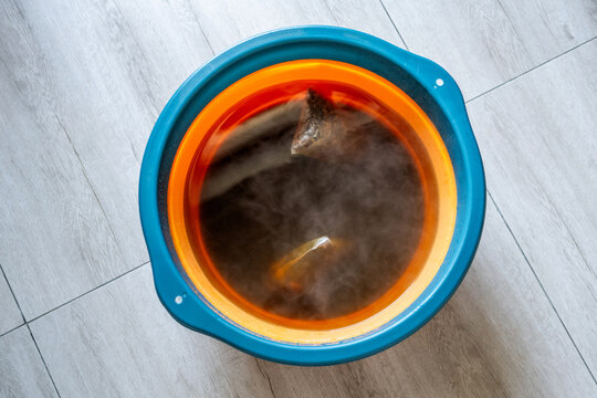A basin of herbal foot-soaking water