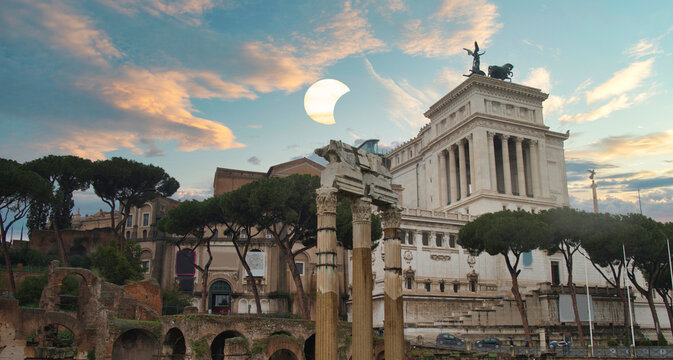 Roman Forum and Vittoriano in Rome against sky with conceptual solar eclipse and copy space