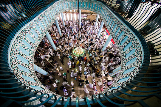 Dhaka, Bangladesh - 20 September 2024: View of the interior of Baitul Mukarram National Mosque filled with a large crowd of worshippers gathered for prayer.
