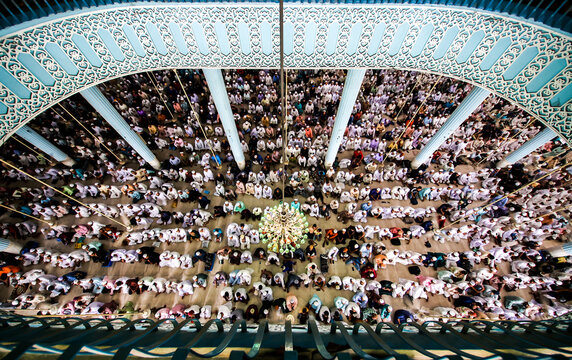 Dhaka, Bangladesh - 20 September 2024: View of a large crowd of worshippers praying inside the Baitul Mukarram National Mosque.