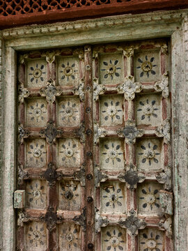 Close-up of an ornate palace door at Jaswant Thada in Jodhpur, Rajasthan, India, featuring aged textures, intricate patterns and traditional Rajasthani architectural details. Photo taken in August 202