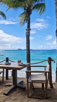Vertical View of Saint Barthelemy Island, Beachfront Restaurant Table and Caribbean Sea Turquoise Water