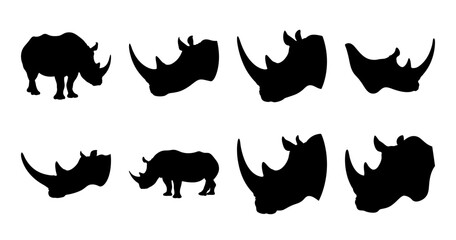 Black silhouette rhinoceros icons in various poses - Collection of stylish black rhino silhouettes in different dynamic poses, perfect for nature, wildlife, or conservation-themed projects. © Sujon