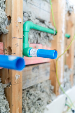Rough in plumbing and insulation in wall stud