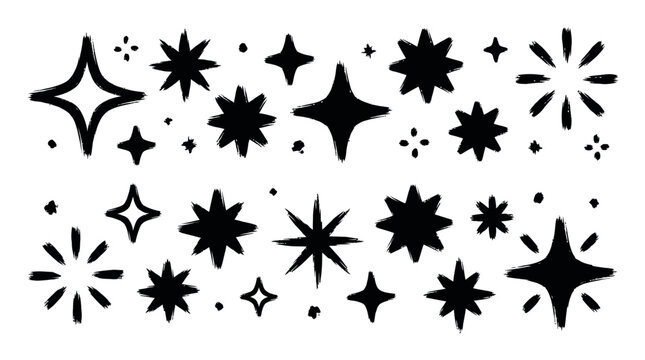 Twenty four black ink brush drawn glitter star shapes for sparkling effect and festive decoration.