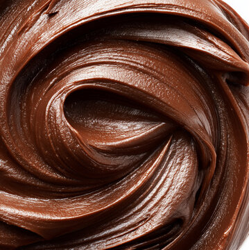 Smooth swirl of melted chocolate sauce isolated on white background with clipping path, concept of sweetness and indulgence