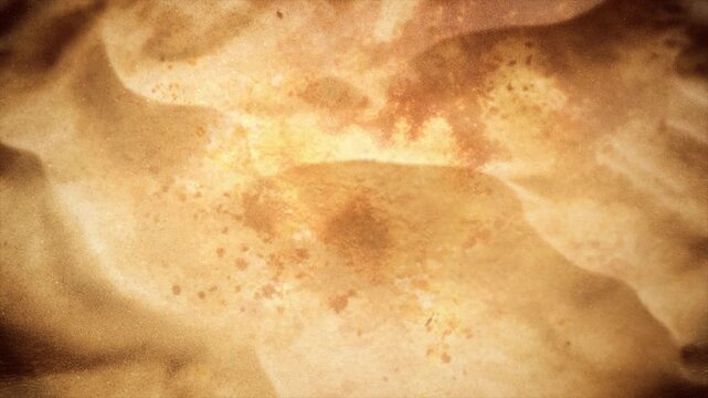 Close up shot of golden pancake texture cooking on a hot pan.