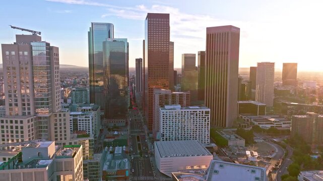 Skyscrapers in Los Angeles. LA skyline in sunset. Sunset over California city. Sunset in Los Angeles. Drone view of Los Angeles skyline. Los Angeles aerial view cityscape. LA skyscrapers in dusk.
