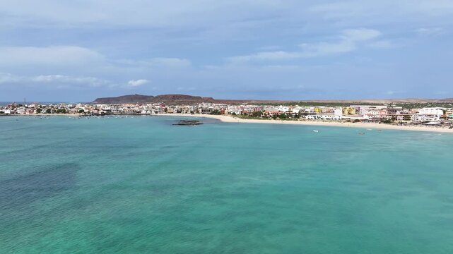 Drone Shot of Sal Rei Town on Boa Vista Island, Cape Verde, Buildings nad Beach by Turquoise Water of Atlantic Ocean