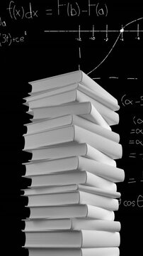 Pile of books and mathematical equations and graphs