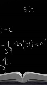 An open book and mathematical equations and figures