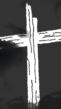 Animation of black clouds over grave cross