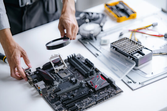 Computer repair technician specialist repairing and testing on Pc