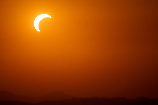 solar eclipse the moon covers the sun Italy Europe