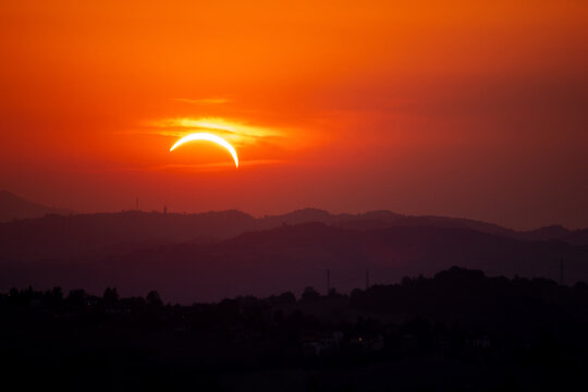 solar eclipse the moon covers the sun Italy Europe
