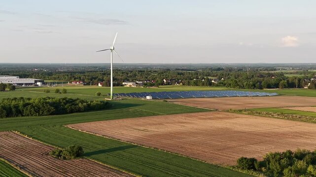 Sustainable energy technology with solar panels and wind mill turbines