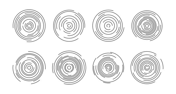 Eight different radial line elements creating abstract concentric circle patterns, suitable for modern design and technology concepts